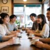 友達とカフェで笑顔で会話